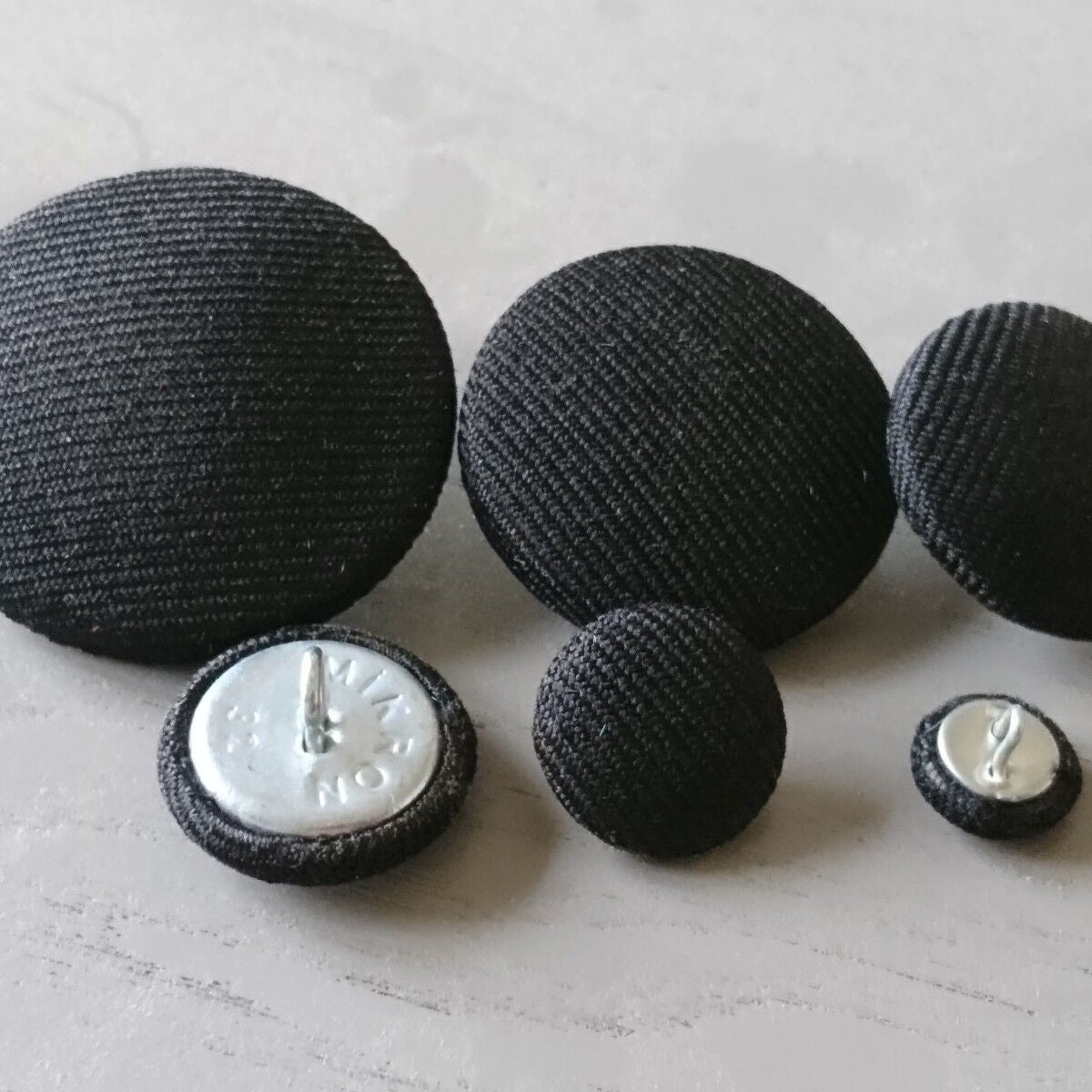 black suit fabric buttons choice - 1